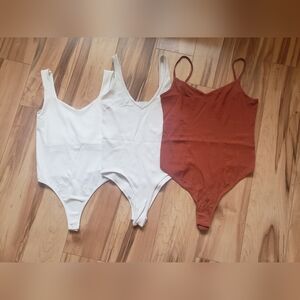lot 3 Free People/Aura bodysuits XS S NWOT FP white clean lines and rust viscose